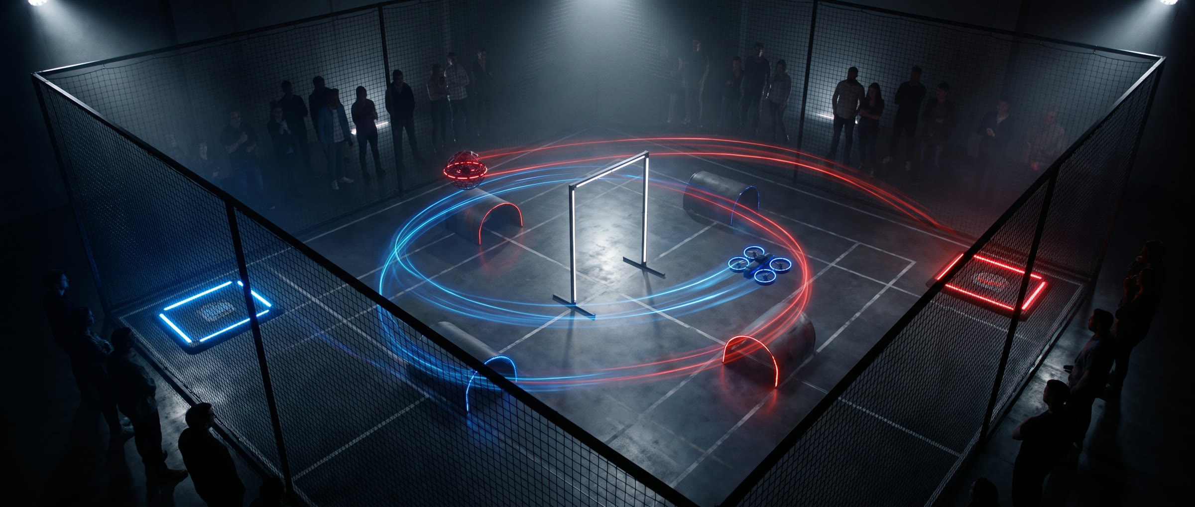 Overhead view of a lit drone arena inside its safety net